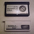 Two versions of the DS Rumble Pack, one full size, and one DS Lite size.
