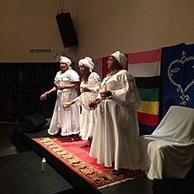 Vodou event held at the National Black Theatre in Harlem, New York City Swearing-in ceremony of Diaspora GwetoDe by Konfederasyon Nasyonal Vodou Ayisyen 07.jpg