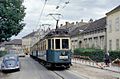 Ein Dreiwagenzug erreicht Baden bei Wien und befährt den eingleisigen Abschnitt am Kaiser Franz Joseph-Ring (1969)