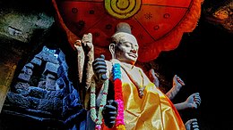 Statue of Vishnu, the principal deity worshipped at Angkor Wat, Cambodia A statue inside the Angkor Wat in Cambodia; January 2020.jpg