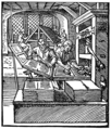 Buchdruck 1568: Rechts im Vordergrund der Papierstapel, der per Handanlage in den Rahmen gelegt wird.