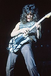"Beat It" features guitar work from Eddie Van Halen. Eddie Van Halen at the New Haven Coliseum 2.jpg