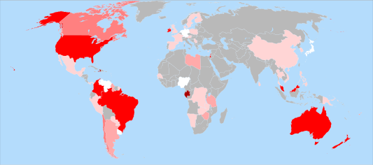Mapa del mundo que muestra los países en gris, blanco y varios tonos de rojo según el porcentaje de la población que consume agua potable fluorada. The U.S. and Australia stand out as bright red (which the caption identifies as the 60–80% color). Brazil and Canada are medium pink (40–60%). China, much of western Europa, and central África are light pink (1–20%). Germany, Japan, Nigeria, and Venezuela are white (<1%).