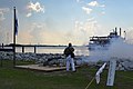 Firing signal cannon at Fort James Jackson