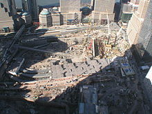 Construction of the September 11 Memorial complex in January 2008 Freedom tower construction.jpg