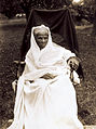 Photographie noir et blanc en extérieur d'Harriet Tubman dans un fauteuil.