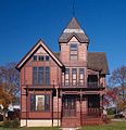 The Herman C. Timm House in New Holstein, Wisconsin, has stickwork painted in a darker brown for contrast.