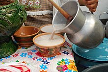 Chocolate being poured at a market at Villa de Etla, Oaxaca MakingHotChocoVillaEtla4.jpg