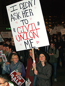 Various advocates of same-sex marriage, such as this protester at a demonstration in New York City against California Proposition 8, consider civil unions an inferior alternative to legal recognition of same-sex marriage. New York City Proposition 8 Protest outside LDS temple 20.jpg