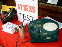 Scientology stress tests being offered on public sidewalk Scientology e meters green black.jpg