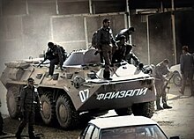 Spetsnaz troops dismount an APC during the war Spetsnaz troopers during the 1992 Tajik war.jpg