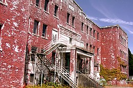 Exterior view of dilapitated St. Michael's Residential School in Alert Bay, British Columbia.