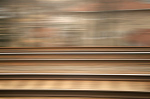 Train tracks, taken from a moving train.