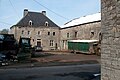 Une belle ferme de Tohogne en pierre du pays sous la neige (rue de Presseux, 19).