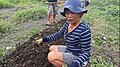 Partner farmer discussing organic farming.