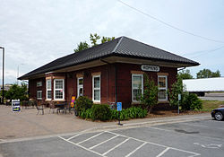 The Hopkins train station, which determined the town's eventual name, is now a student-run coffee house. 2009-0612-05-HopkinsDepot.jpg