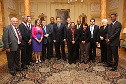Leaders of the Overseas Territories with the Prime Minister, David Cameron, in 2012 British Overseas Territories Joint Ministerial Council with Cameron.jpg