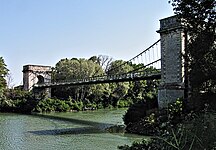 El Pequeño Ródano, que abarca desde el histórico puente colgante entre Arles-Trinquetaille y Fourques