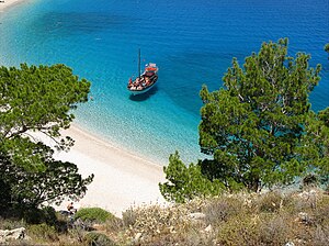 English: Karpathos is an island between Rhodos...