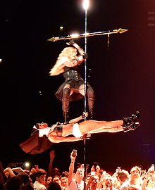 Madonna aged 57. Madonna's concerts usually demands a high level of aerobic athletic fitness and high-energy choreography. While she received praises by this over her career, it garnered more as she turned older. Madonna - Rebel Heart Tour Cologne 2 (23245940845).jpg