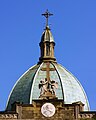 The patinated dome of the cathedral and its four-armed cross