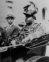 Marcus Garvey, a prominent black nationalist theorist who heavily influenced Rastafari and is regarded as a prophet by many Rastas Marcus Garvey (1922).jpg