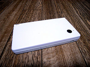 A closed DSi, showing the external facing camera.