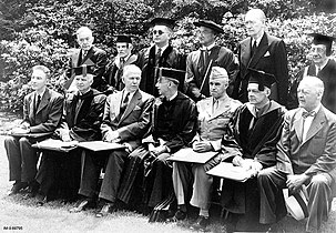 Award of honorary degrees at Harvard to J Robert Oppenheimer (left), George C. Marshall (third from left), Omar N. Bradley (fifth from left), and T. S. Eliot (second from right). The President of Harvard University, James B. Conant, sits between Marshall and Bradley. June 5, 1947.