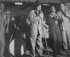 Bonano performs (center at microphone) in New Orleans in 1950. Photo by Stanley Kubrick