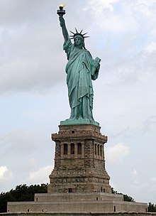 The Statue of Liberty, a symbol of American freedom and openness to immigration Statue of Liberty 7.jpg