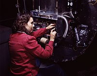 Switch boxes on the firewalls of B-25 bombers are assembled by women workers at North American Aviation Inc's, Inglewood, Calif, plant.jpg