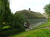 Boerderij, oorspronkelijk hallehuis met middenlangsdeel, later uitgebreid tot krukhuis, opgetrokken in Ambachtelijk-traditionele bouwtrant