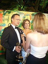 Tom Hanks and Rita Wilson made international headlines in March 2020 after being hospitalised with the virus in Queensland. (Photo taken after the 2008 Emmys in California.) Tom Hanks 2008.jpg