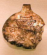 Medallón de plata del período de decadencia de Urartu, Karmir Blur, Museo de Historia de Armenia.