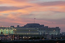 Amiri Diwan of the State of Qatar, administrative office of the Emir. View of Amiri Diwan from the corniche.jpg