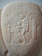 Ancient Greek athlete balancing a ball on his thigh, Piraeus, 400-375 BC