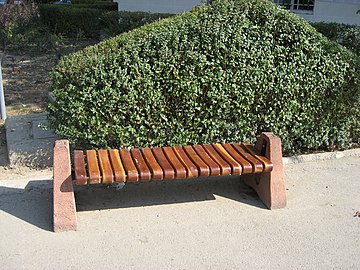 An open park bench in Tehran