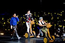 Big Bang fans (VIPs) hold crown shaped light sticks during a concert: this is the symbol of the fan club Big Bang 2012 3.jpg