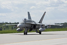 A 425 Squadron CF-18A Hornet after undergoing IMP Phase II, distinguishable because of the IFF antenna on its nose. CF18imp2.jpg
