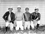 American jockeys with caps in 1922.