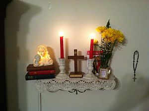 Many devout Christians have a home altar at which they (and their family members) pray and read Christian devotional literature, sometimes while kneeling at a prie-dieu. Home Altar.jpg