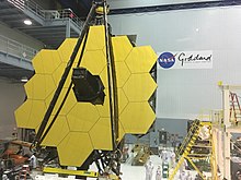 Main mirror of James Webb Space Telescope assembled at Goddard Space Flight Center, May 2016. James Webb Space Telescope Revealed (26832090085).jpg