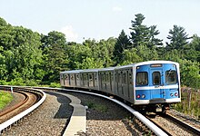 A universal transit vehicle on the Baltimore Metro SubwayLink departing Milford Mill station MTAM Millford-Mill-departing-train.jpg