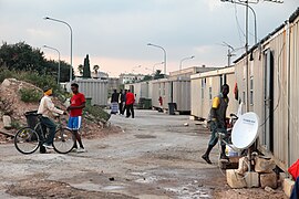 immigranten bij het vluchtelingenkamp Ħal Far