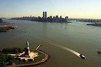 The view of New York City showing the Statue of Liberty, Empire State Building, and the World Trade Center, July 2001.