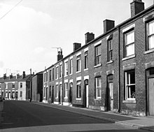 A row of brick-built terraced housing