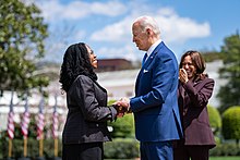 President Joe Biden with his Supreme Court appointee Justice Ketanji Brown Jackson and (in background) Vice President Kamala Harris following Brown Jackson's 2022 United States Senate confirmation P20220408AS-1467 (52067437977).jpg