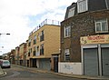 Modern buff brick buildings (centre)