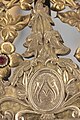 Detail of the "Auspice Maria" on the crown of the frame