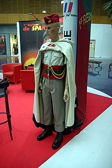 French Spahi uniform today: 2006 pattern parade uniform for a marechal des logis
of the 1st Spahi Regiment, with red bonnet de police
and distinctive burnous
. Spahi-img 0990.jpg